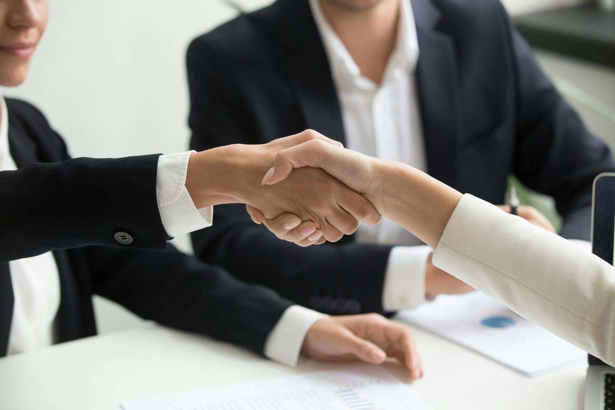 Introverted professional using networking strategies for professionals at a quiet coworking space